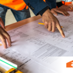 skilled tradespeople reviewing plans